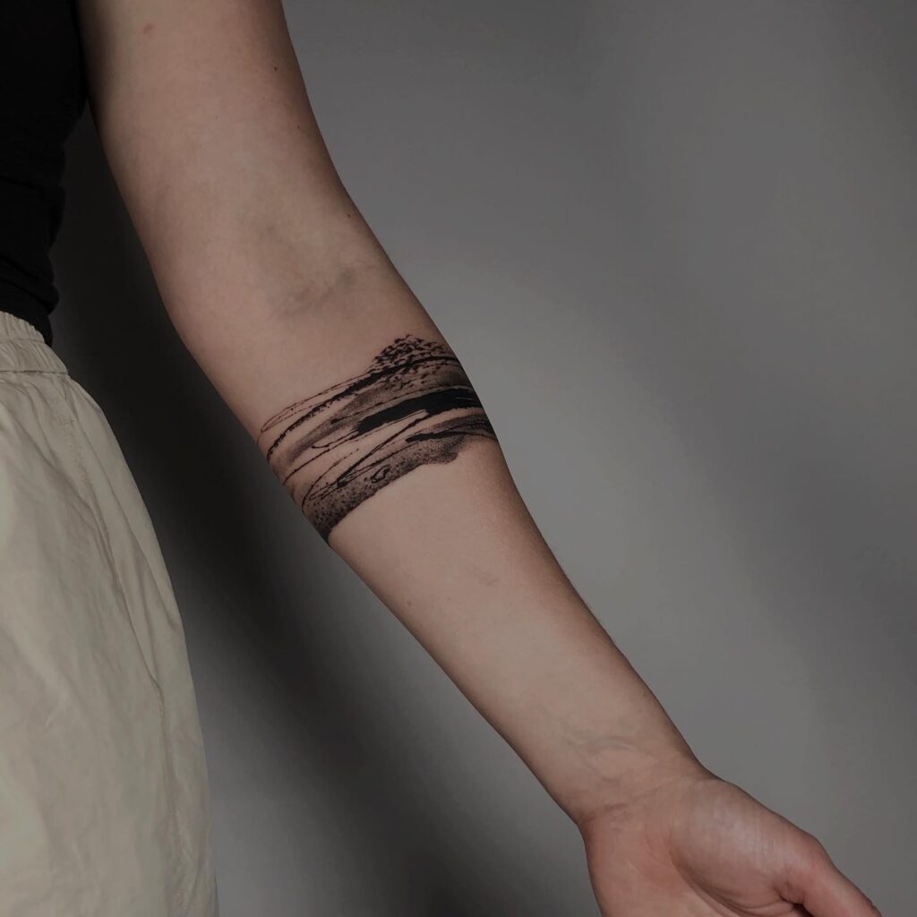 Circular elegance round flow bracelet tattoo on the forearm