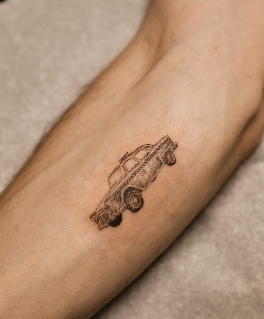 Classic Vintage Taxi Tattoo on Lower Leg for Men, Representing Nostalgia and Travel Memories – Car Tattoo Ideas