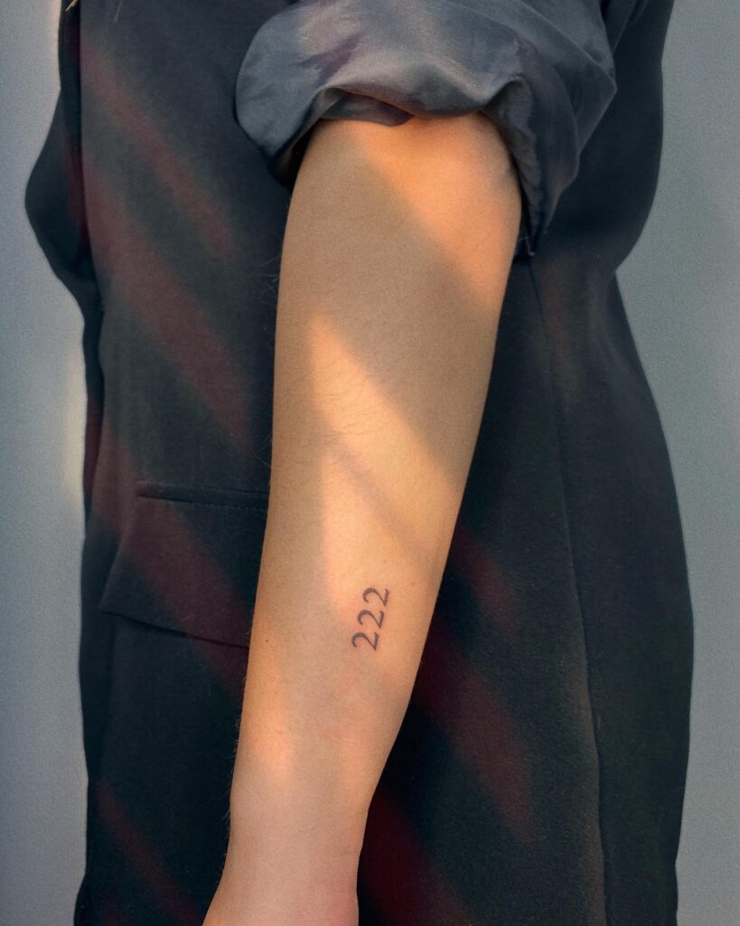 Classy 222 Side Forearm Tattoo for Females: Elegant Placement, a Subtle Symbol 