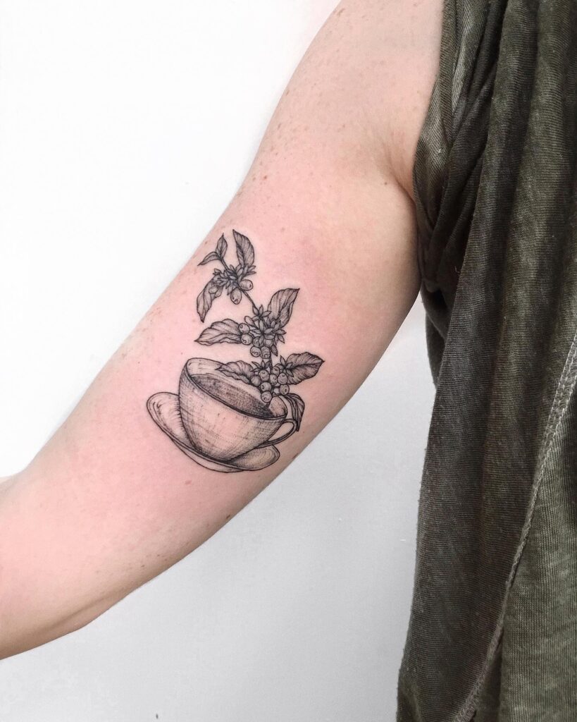Coffee plant tattoo on biceps and forearm expressive adornments