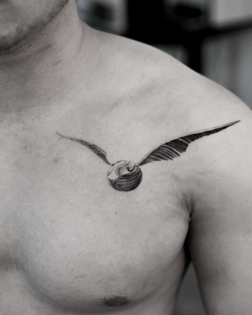 Collar bone chronicles men's golden snitch tattoo ideas