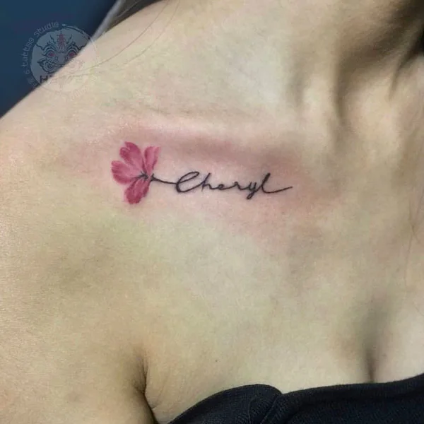 Collarbone name tattoo