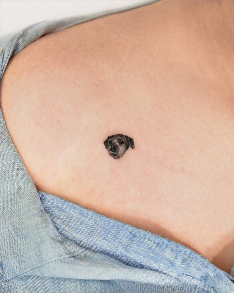 Collarbone Portrait Tattoo, a 2cm Memorial to Her Late Dog in Black and Grey: Canine Tribute