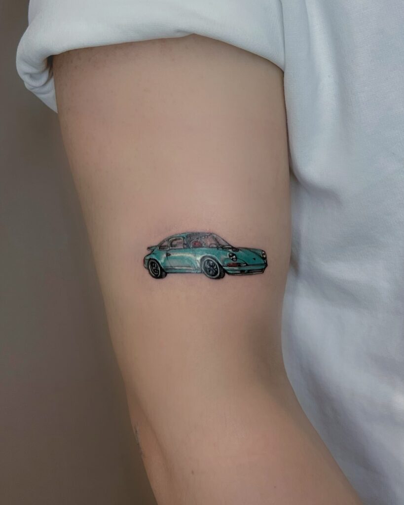 Color Porsche 911 Tattoo Above the Elbow – Car Tattoo Ideas