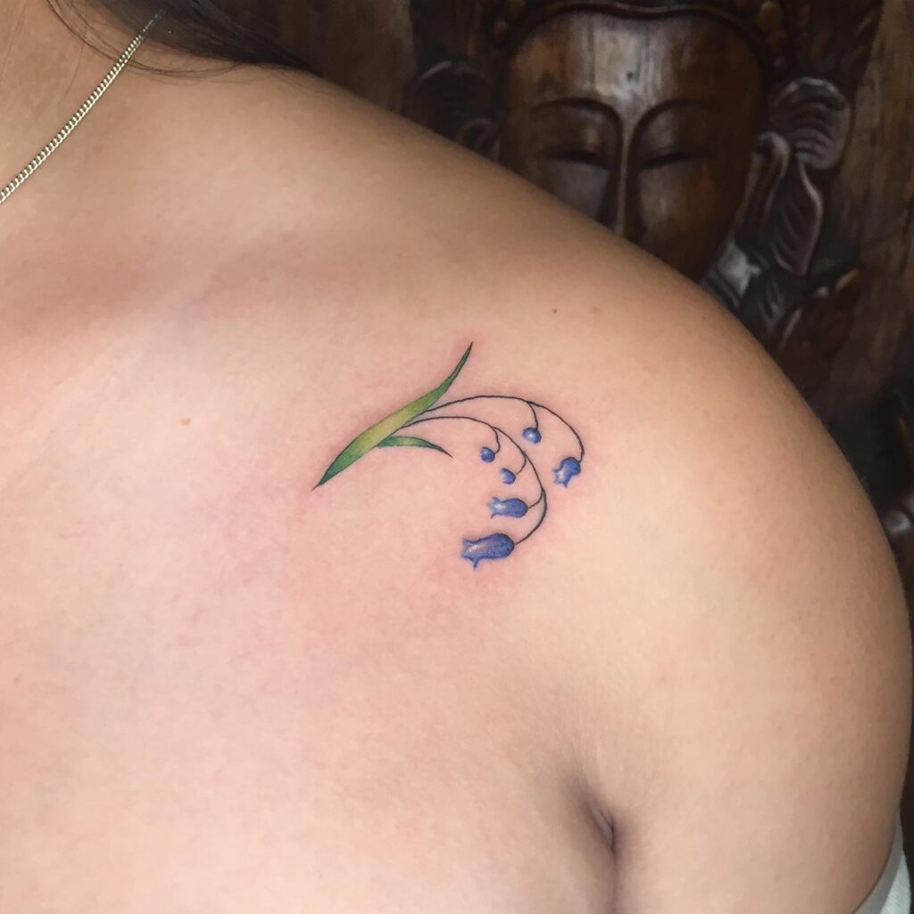 Colored Cute Little Bluebells Adorning the Arm and Shoulder: Arm Bouquet
