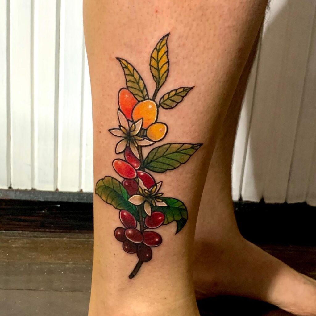 Colorful Coffee Plant Tattoo on Leg Vibrant Botanical Ink Design