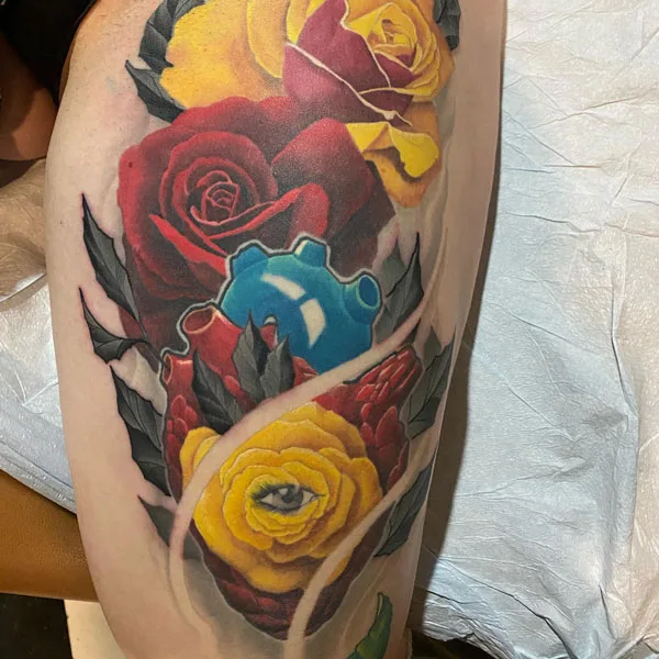 Colorful December birth flower tattoo