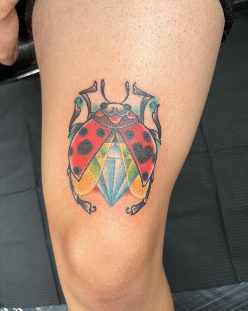 Colorful Ladybug Tattoo Small With Open Wings