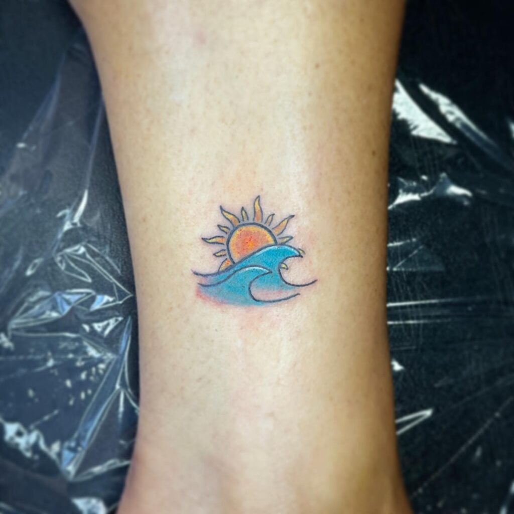 Colorful ankle sun and wave tattoo beachy delight