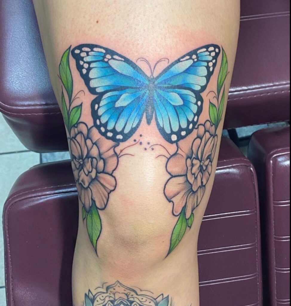 Colorful Butterfly Above The Knee Tattoo Design