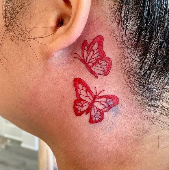 Colorful butterfly tattoo design with image