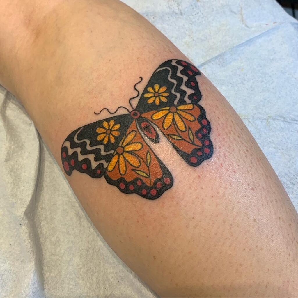 Colorful Butterfly Tattoos Creating a Vibrant Scene on the Calf: Butterfly Kaleidoscope 