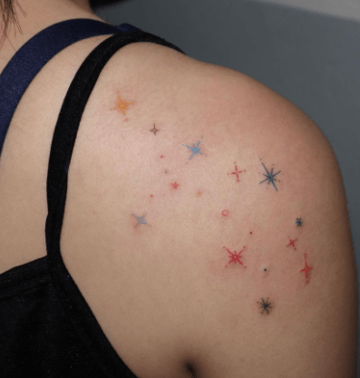 Colorful Celestial Star Back Shoulder Tattoo Colorful Celestial Star Back Shoulder Tattoo