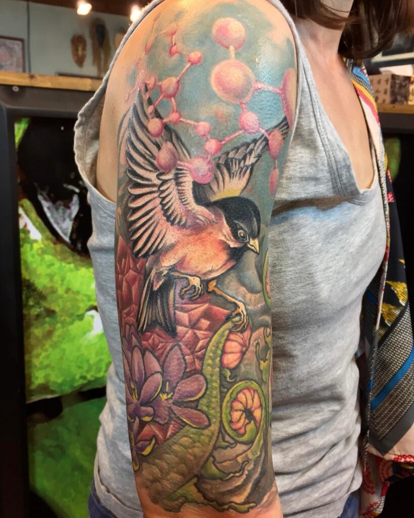 Colorful Chickadee Nature Half Sleeve Tattoo: A Vibrant Expression for Women
