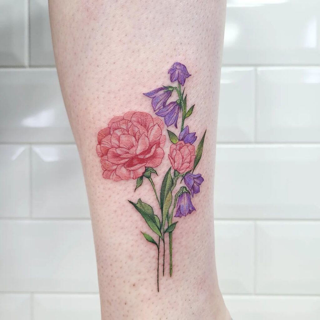Colorful lower leg bluebell flower tattoo for females floral beauty
