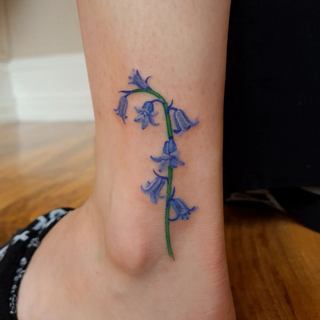Colorful meaningful ankle bluebell tattoo ideas for women