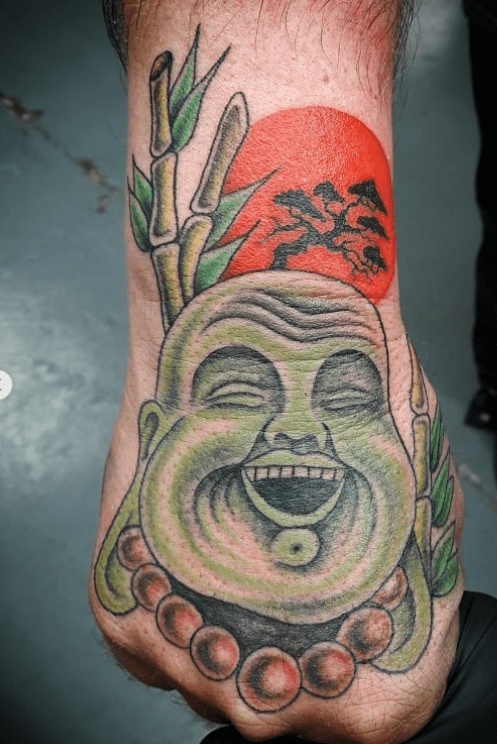 Colourful Laughing Buddha Tattoo