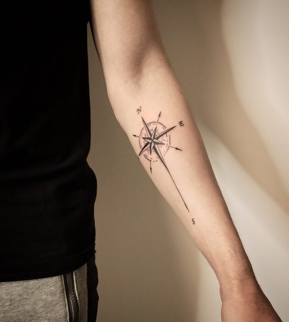 Compass Tattoo on the Forearm in Black and Grey for a Subtle Impact: Grey World