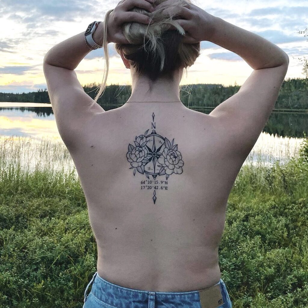 Compass Tattoo with Florals and Coordinates on the Back for a Personal Touch: Floral Coordinates
