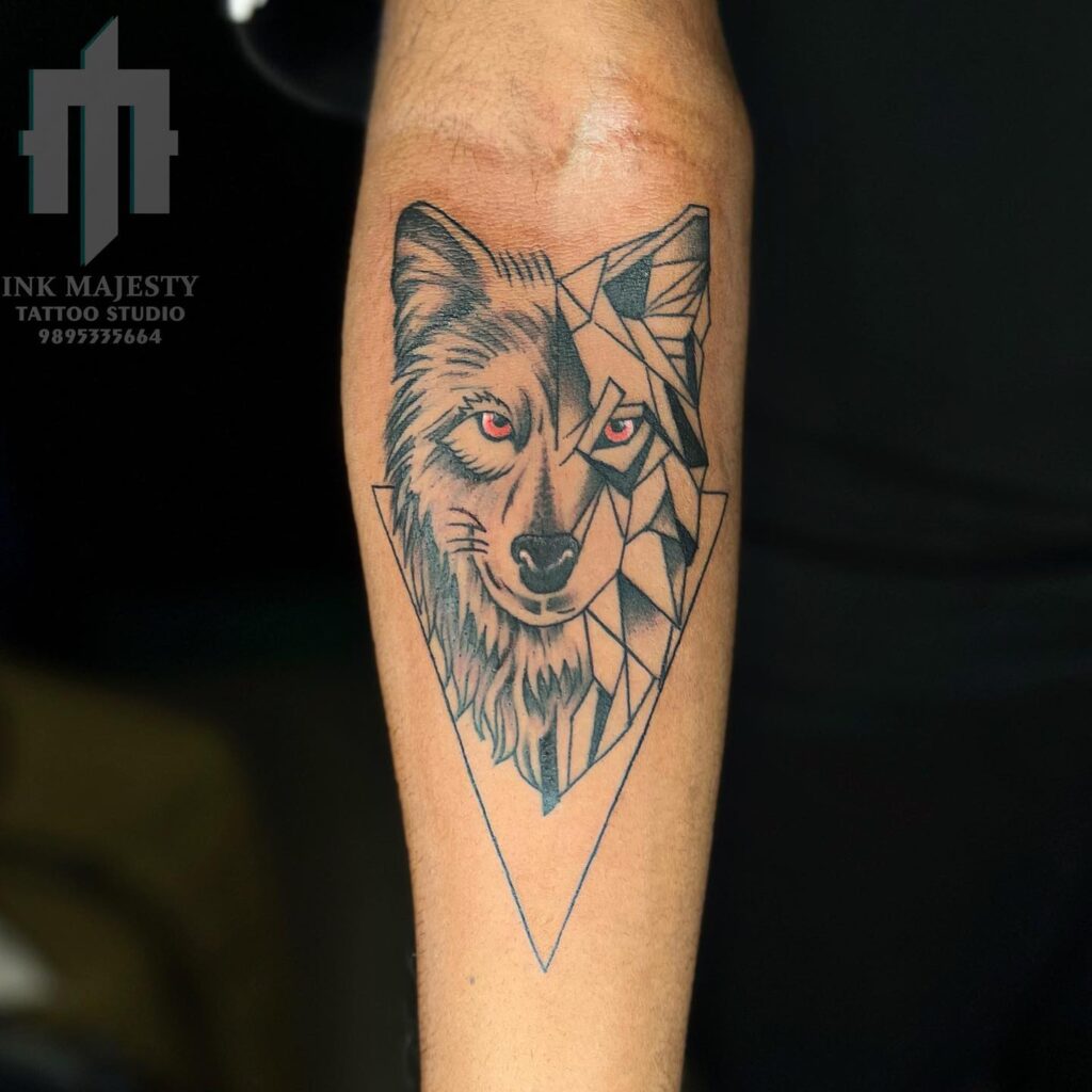 Compelling forearm tattoo art fierce wolf faces with red eyes