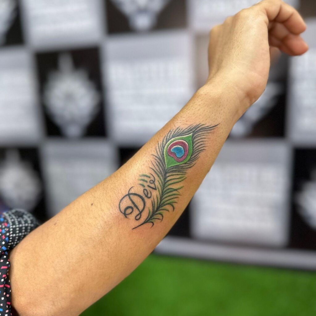 Cool Colorful Outer Forearm Peacock Feather Tattoo Ideas Unique and Stylish