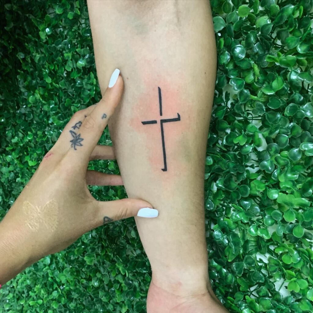 Cool Cross Tattoo on the Forearm: Faithful Symbol