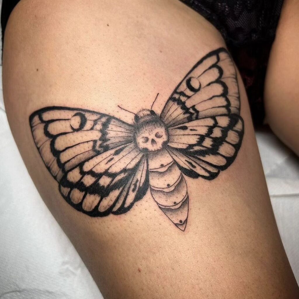 Cool moth tattoo on thigh mysterious nocturnal elegance