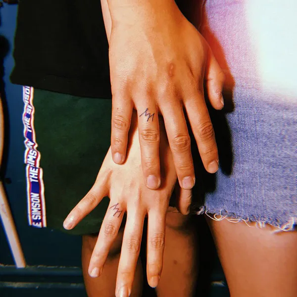 Couple Finger Tattoo 1