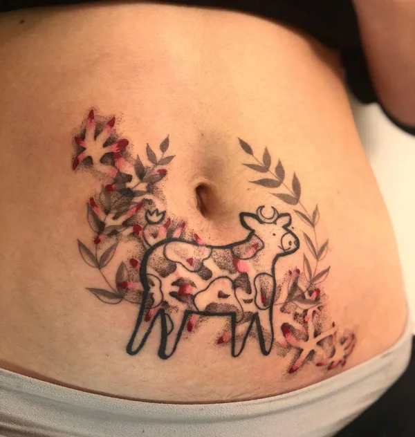 Cow belly button tattoo