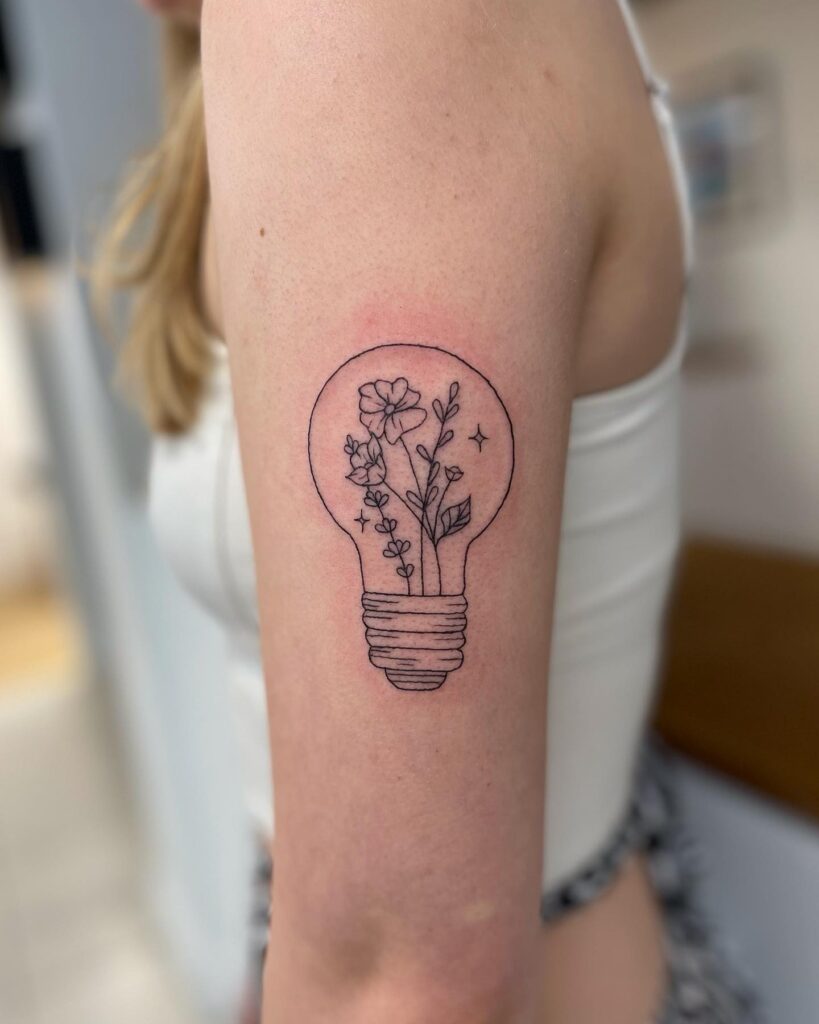 Creative Cute Upper Arm Tattoos for Females Light Bulb Floral Fusion