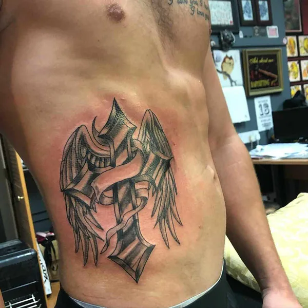 Cross Rib Tattoo