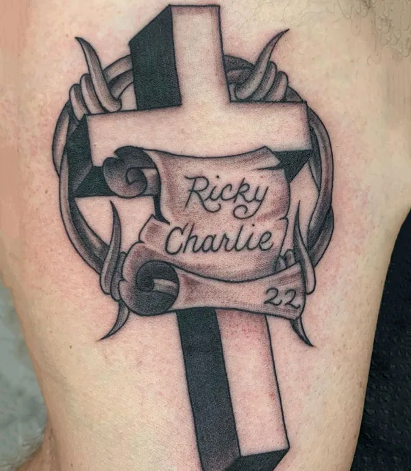 Cross name tattoo