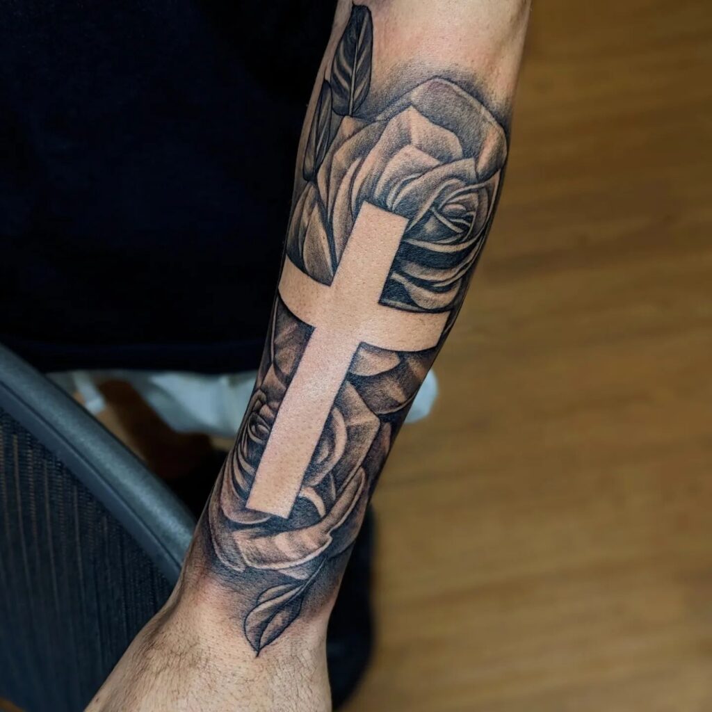 Cross with roses forearm tattoo designs for men artful statements