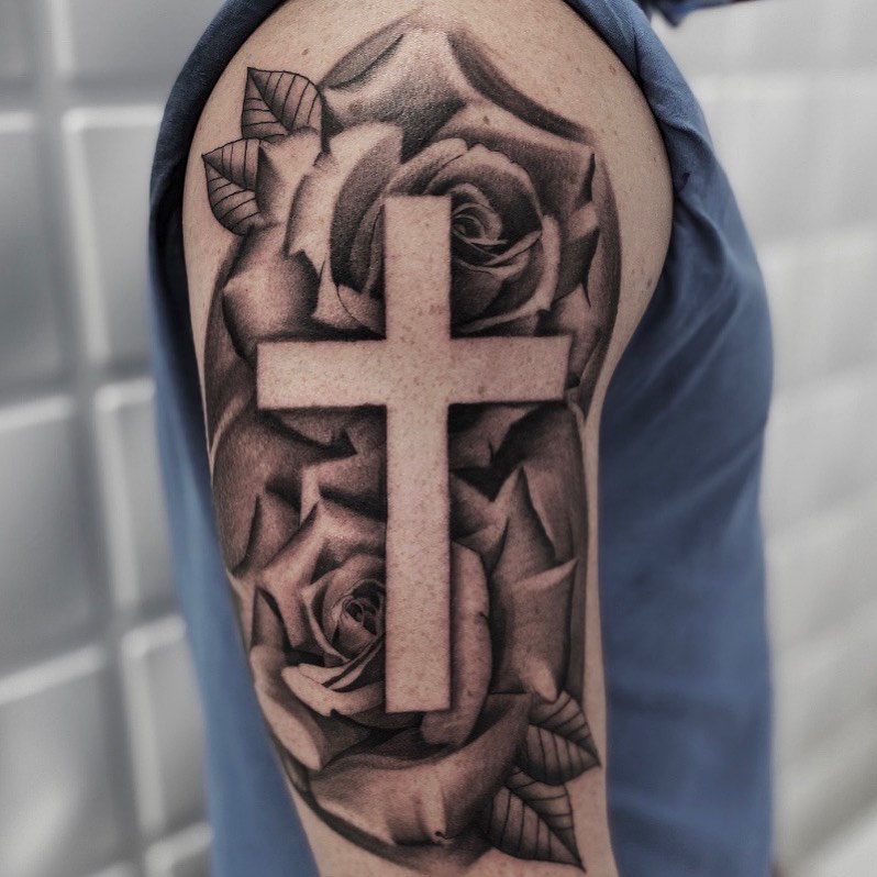 Cross with Roses Tattoo on the Upper Arm for Men, Personalized Artistry: Custom Devotion