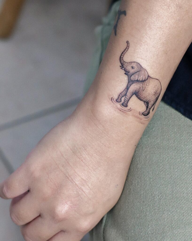 Cute black and grey side view elephant with upping trunk: realistic wrist elegance