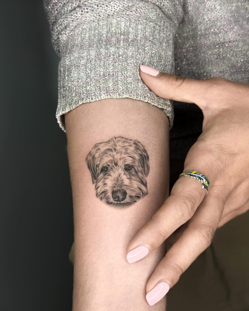 Cute Goldendoodle Portrait Tattoo Above the Elbow: Golden Charm