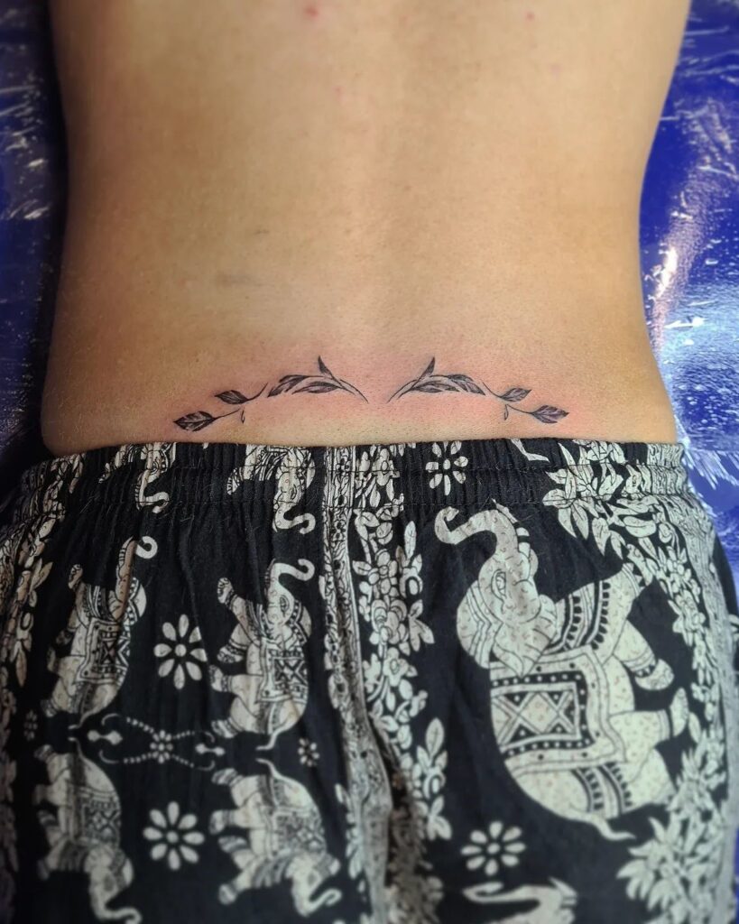 Cute Lil Lower Back Tattoo For Female: Whimsical Charm