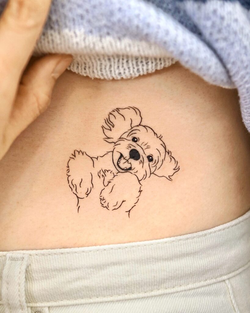 Cute Puppy Tattoo in Line Drawing Style on the Rib: Puppy Love Lines