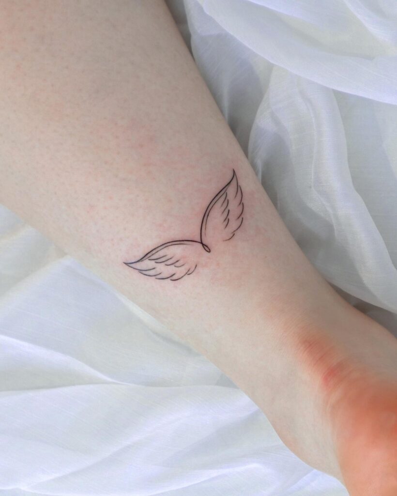 Cute Wings Tattoo Back of the Ankle, a Symbolic Flight: Ankle Aeronautics