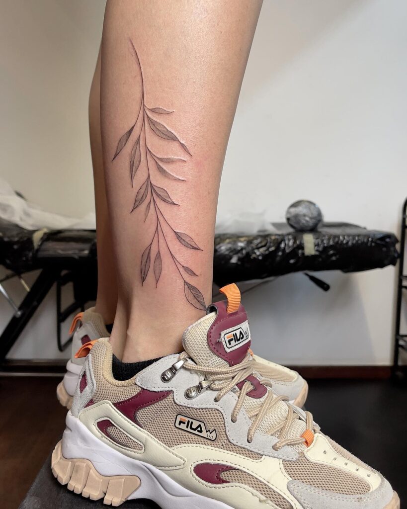 Dainty willow branch tattoo leg for girls
