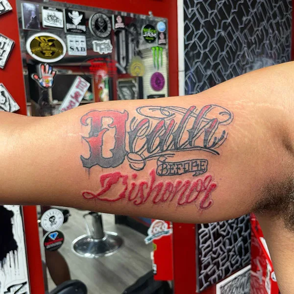 Death before dishonor bicep tattoo