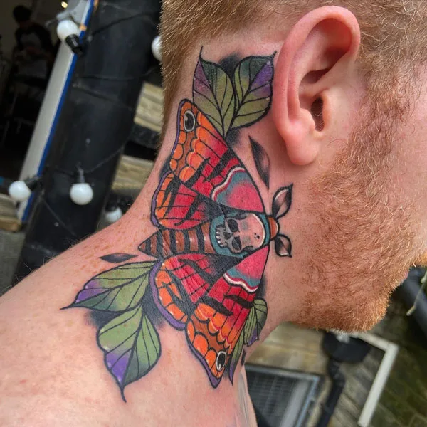 Death moth neck tattoo
