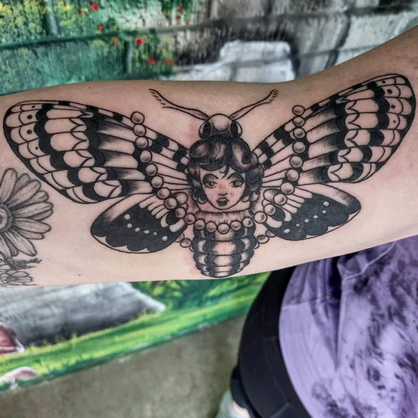 Death moth tattoo 25