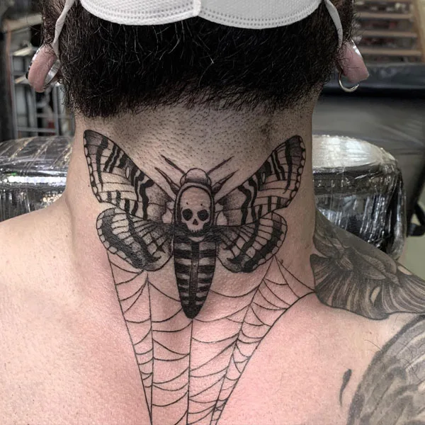 Death moth tattoo 53