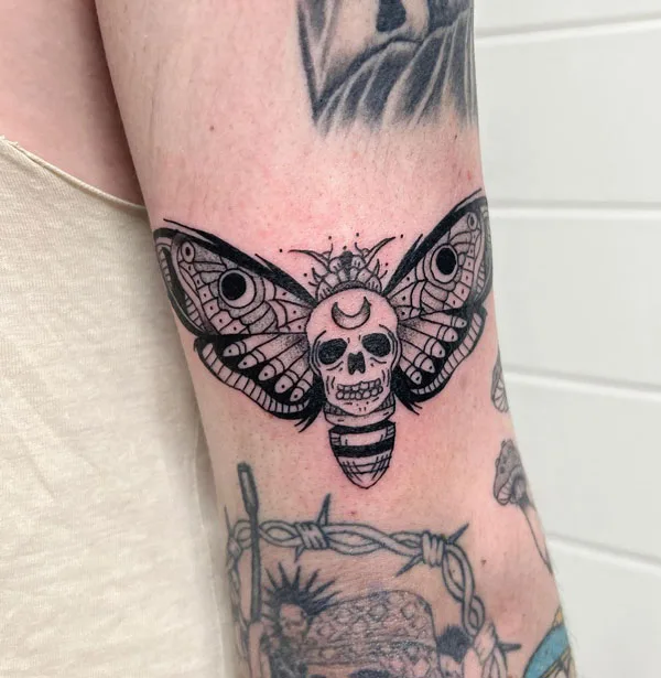 Death moth tattoo 76