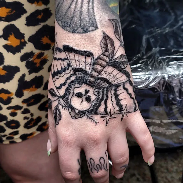 Death moth tattoo 90
