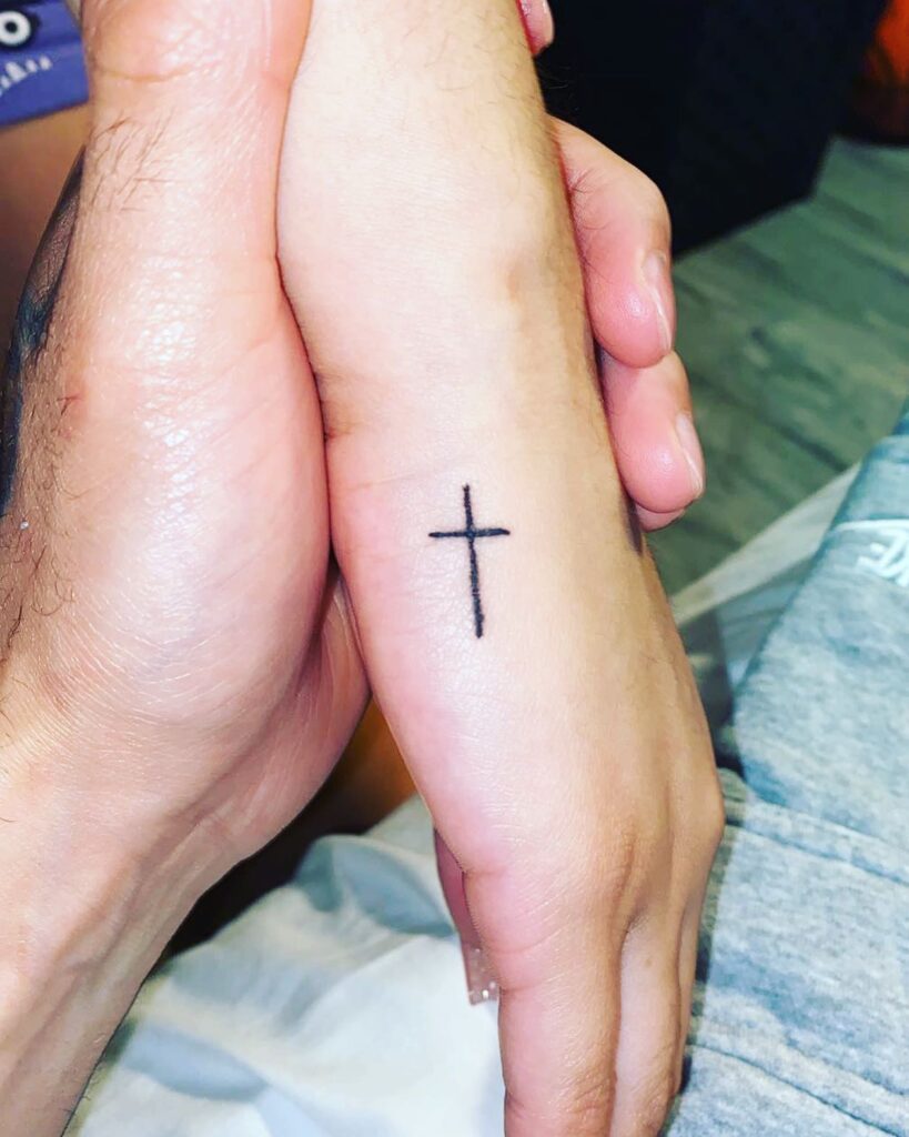 Delicate Fingertip Adornment Minimalistic Cross Tattoo for Girls