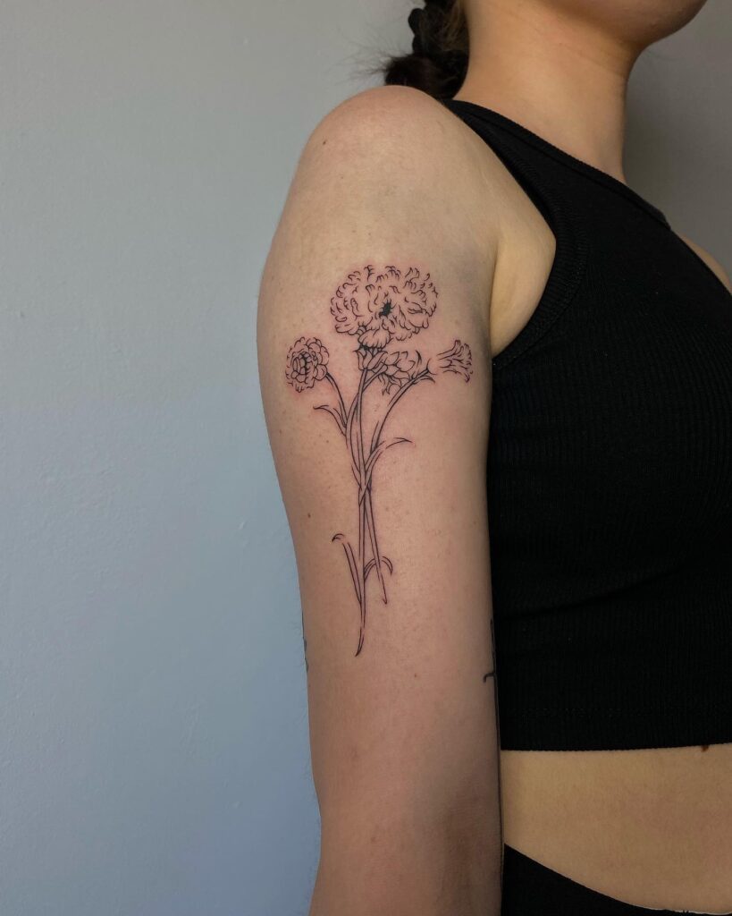 Delicate Flower Pattern Tattoo on Upper Arm Intricate Feminine Beauty