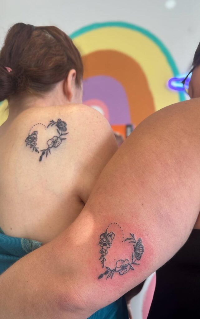 Delicate Floral Heart Mother Daughter Tattoos Representing Eternal Love