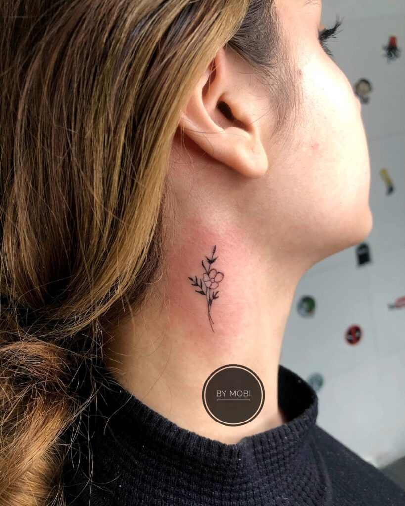Delicate Floral Neck Tattoo Fine-Line Minimalist and Symbolic of Growth